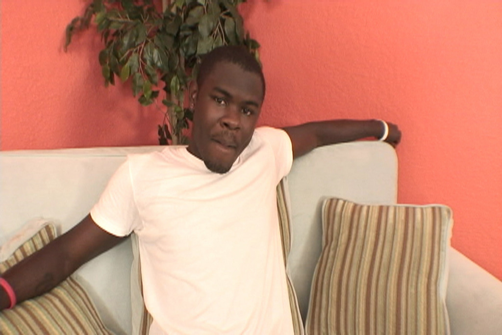 Malvin Blackwell posing shirtless to display his exceptionally toned physique and muscular shoulders