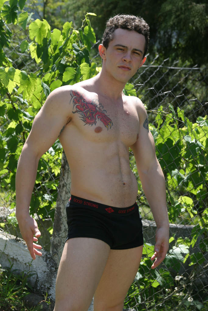 Tattooed hunk passionately sucking Matt's thick cock outdoors